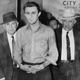 Richard Hickock with Kansas special agents in 1960. Image via AP.